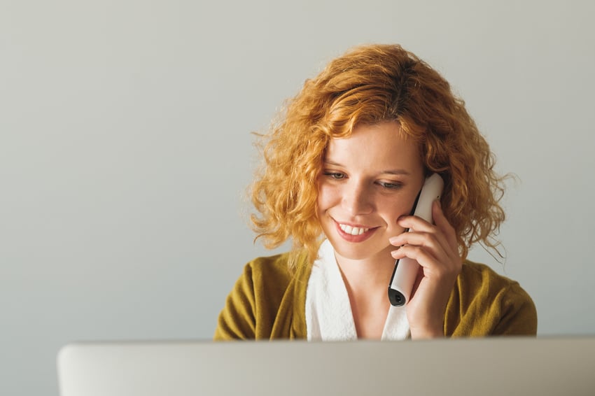 Businesswoman Speaking On The Phone At The Office